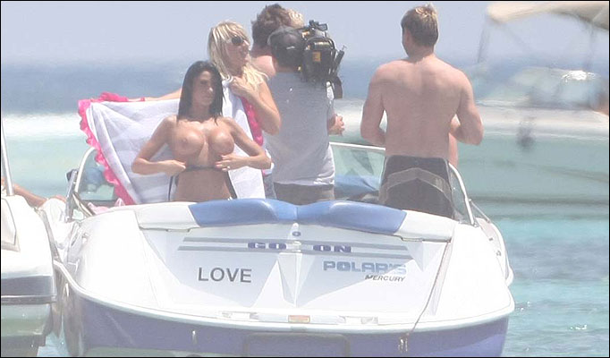 Katie-Price-Boob Finding tough to keep them caged!